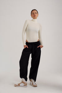 ACHERON Base Layer Turtleneck Bodysuit in Cream
